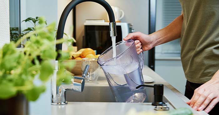 While you can't totally purify tap water at home, a filtered pitcher can help.